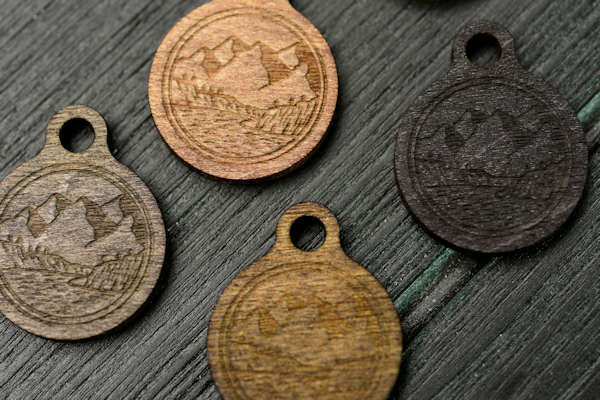 Wooden keychains and trolley coins with logo