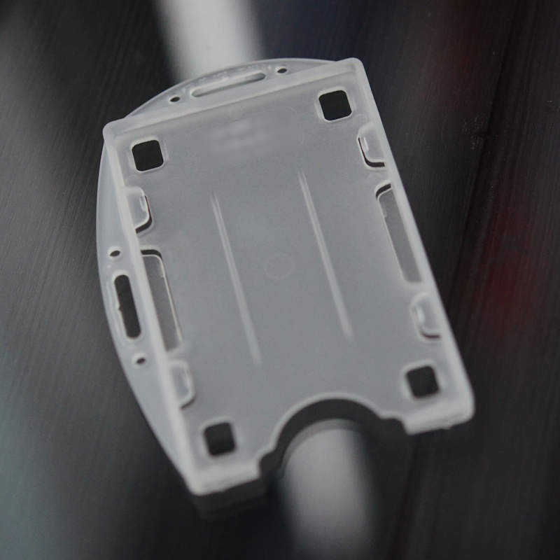 Translucent Double sided twin ID-card holder for two standard size ID-cards. Can be worn vertically or horizontally. Each card is on separate sides of the card holder.