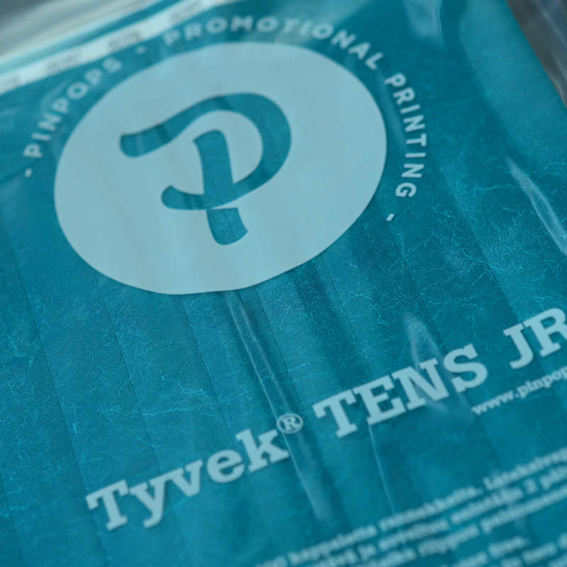 Teal Tyvek Tens wristband with a permanent closure. Prenumbered in sequential order.