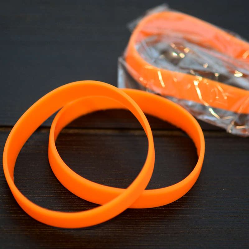 Orange Silicone Wristband stock model at 202x12mm